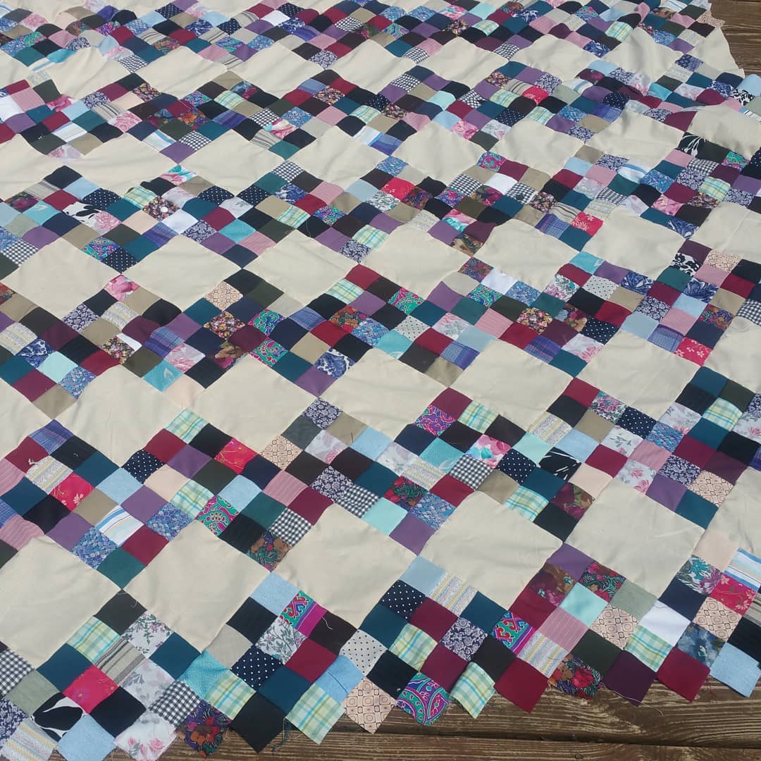 Handmade quilt with checkerboard pattern